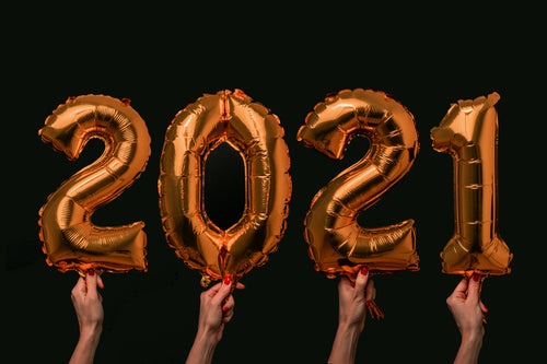 2021 foil balloons on black background