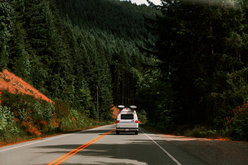 van driving through mountains