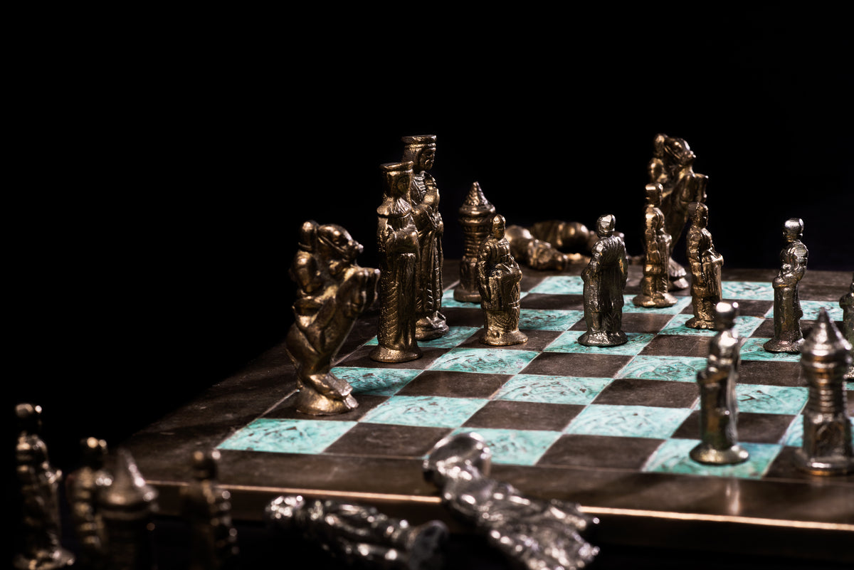 a beautiful chess set mid-game