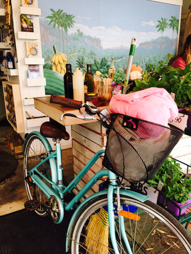 a bicycle in a flower shack