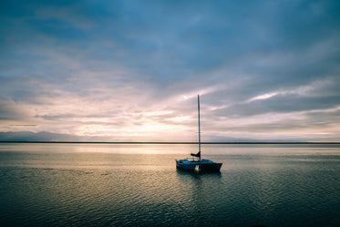 a boat sails on the water