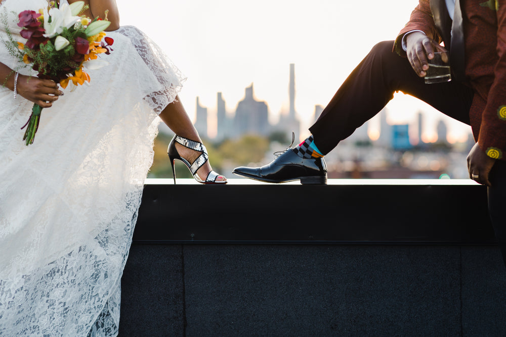 a bride and groom show off their style