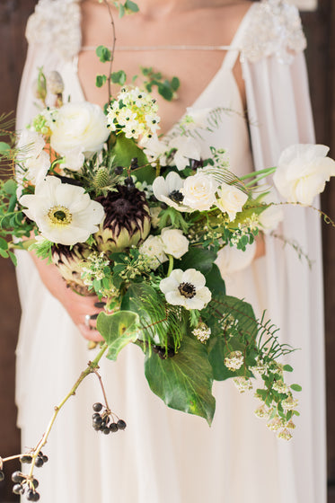 a bride holds her bouquet
