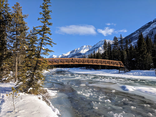 a bridge of a frozen river