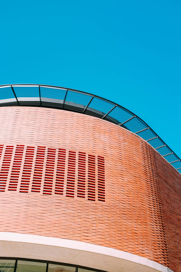 a building sheathed in weave pattern