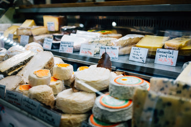 a cheese counter at a local market