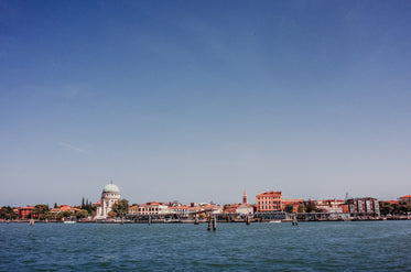 a city scape viewed from the water