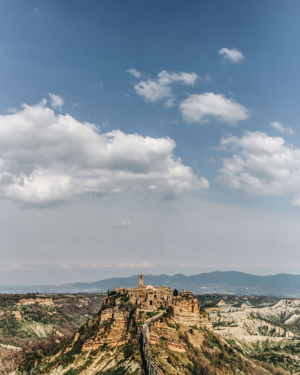 a city sitting upon a hilltop