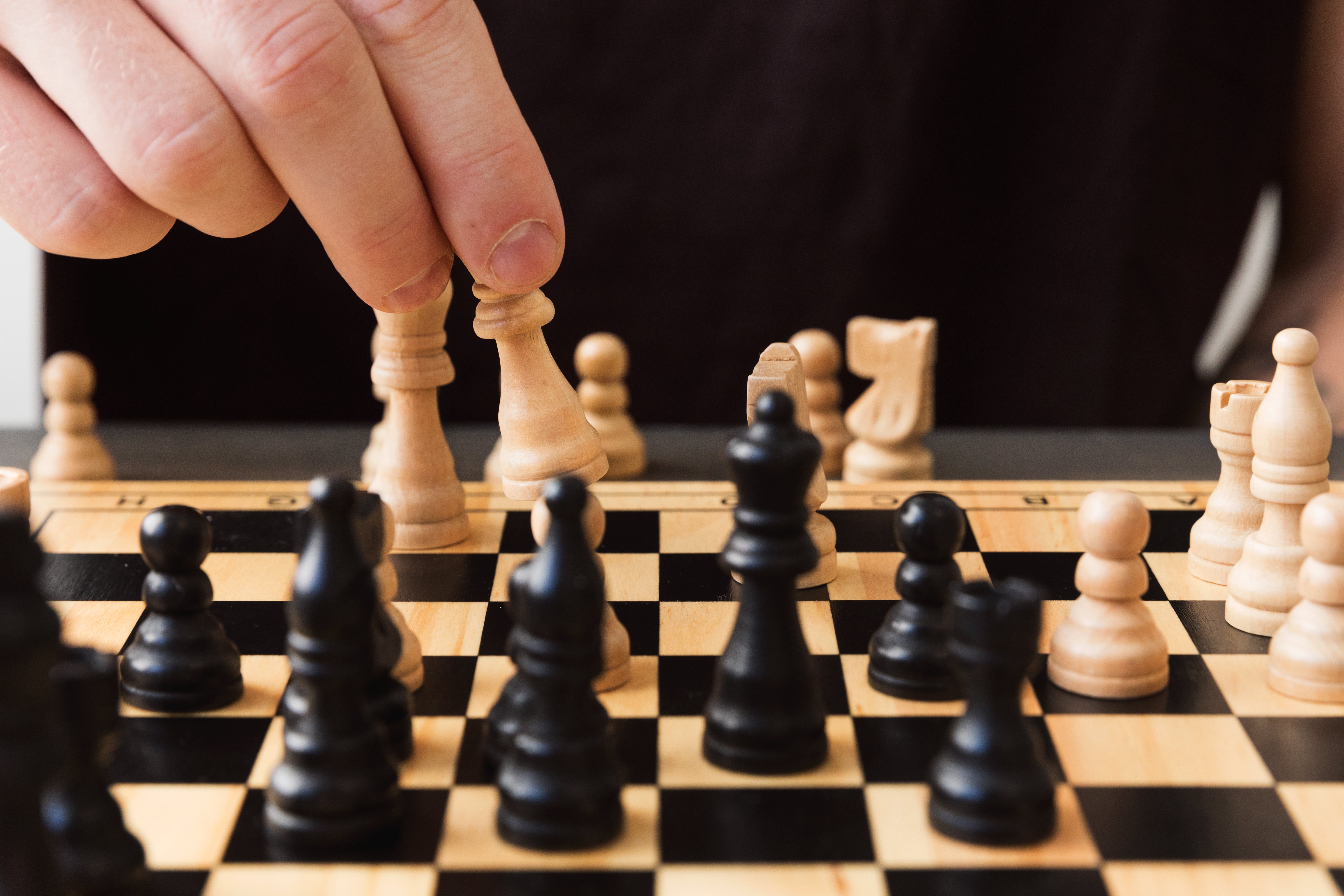 Close-Up Shot of Chess Pieces · Free Stock Photo