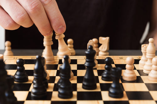 a close up of a game of chess