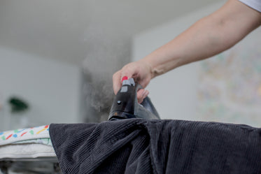 a corduroy jacket gets ironed