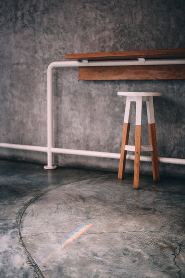 a counter and accompanying stool