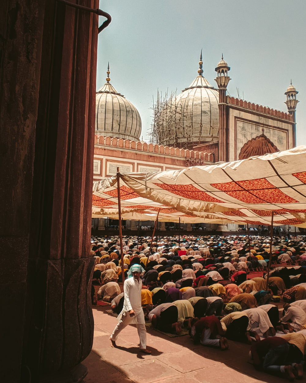 a crowd of worshippers at friday prayers