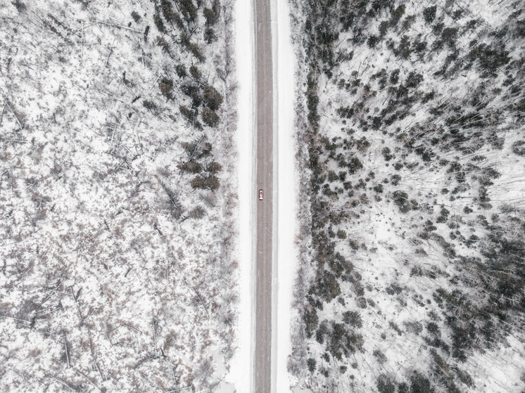 a-drone-view-of-a-red-pickup-truck-on-a-