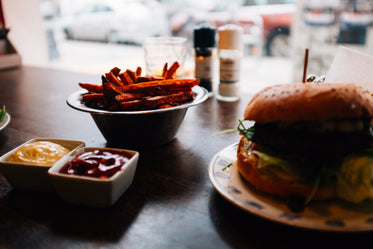 a hamburger with a side of fries