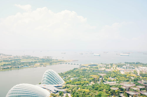 a hazy skyline ocean view of singapore