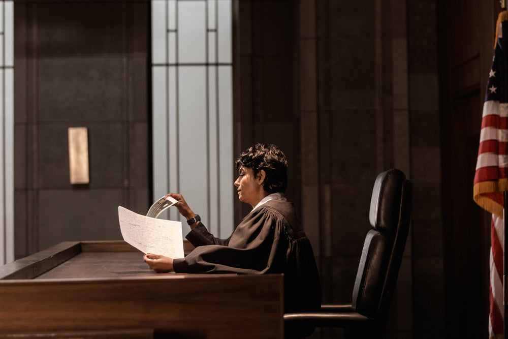 a judge reviewing evidence in court