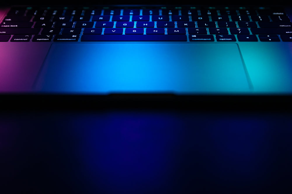 a laptop keyboard brightly lit