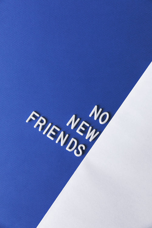 a letter board spells out "no new friends"