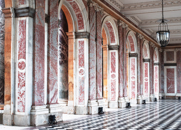 a line of marble archways