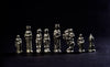 a line up of chess pieces