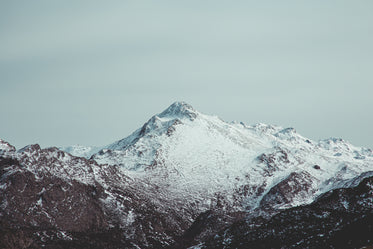 a lonely mountain covered in snow