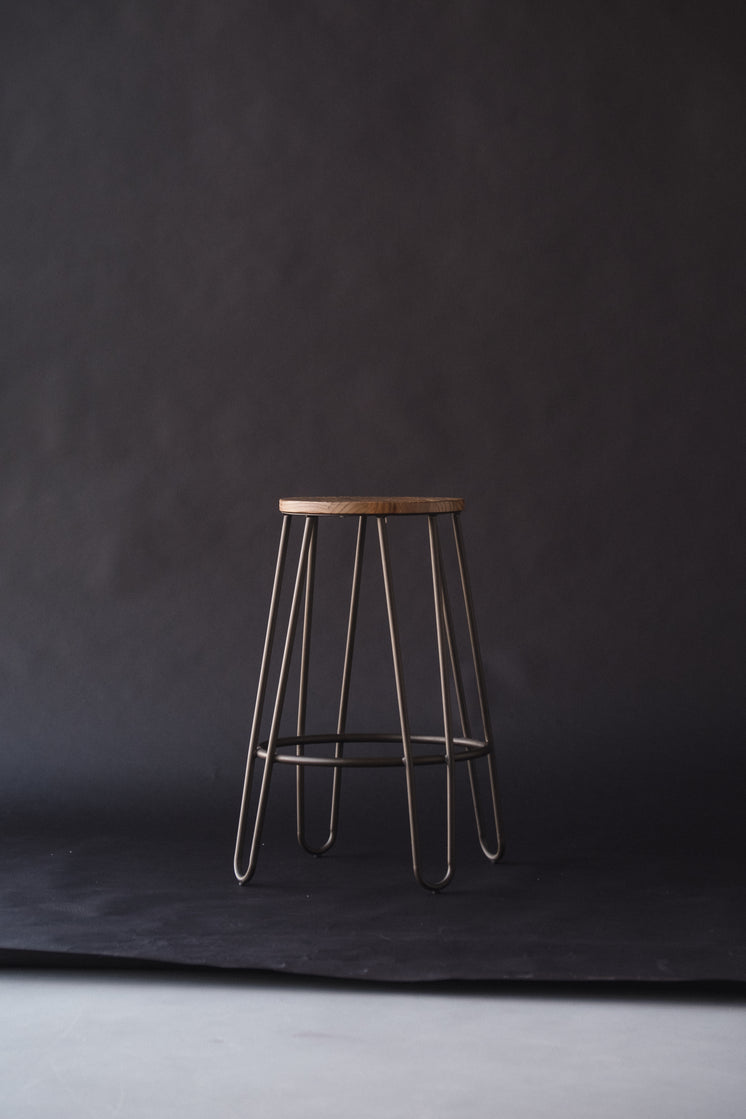 A Lonely Stool On a Backdrop