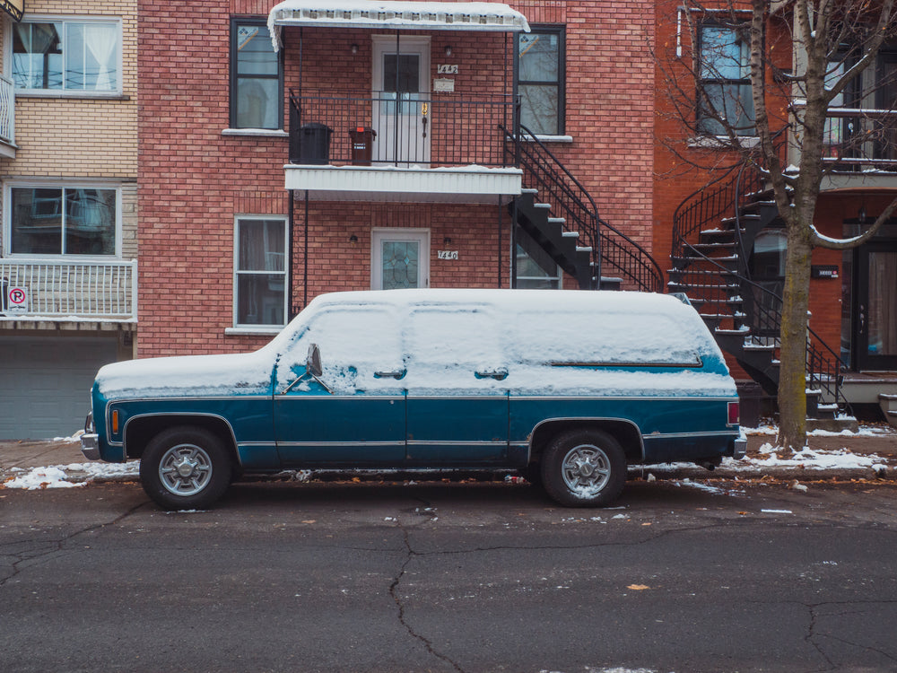 a look into the past with a classic snow-covered vehicle