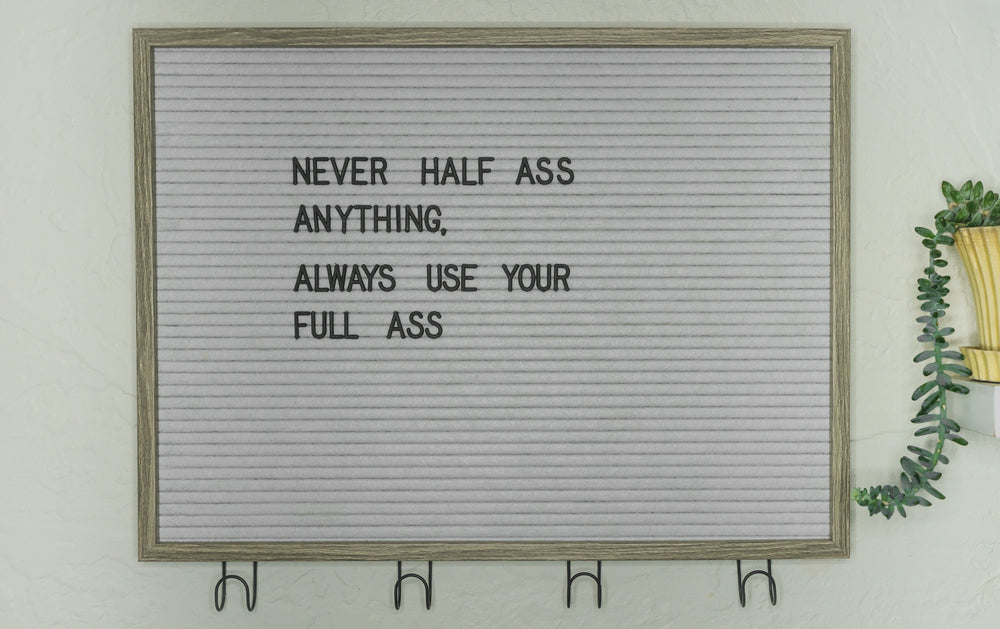 a motivational letter board implores you to give your all