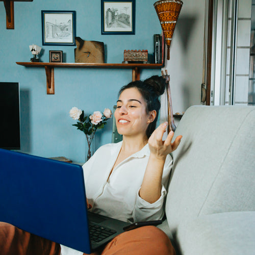 A Person Talking To Their Laptop Screen