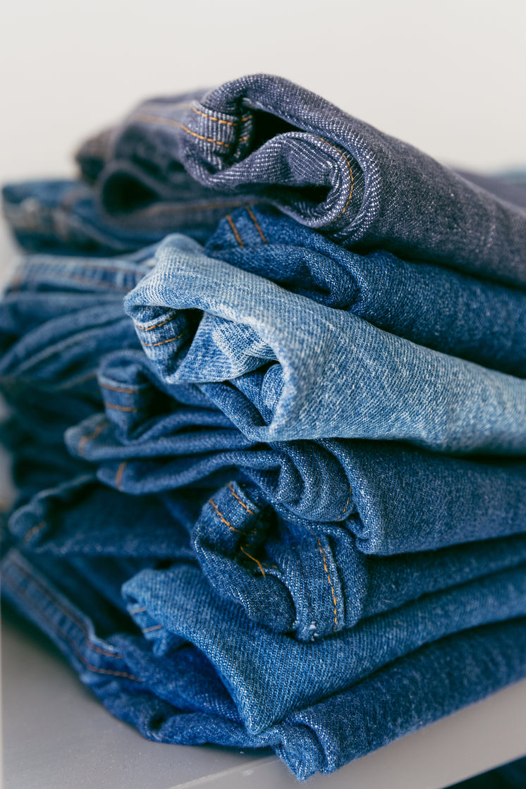 a-pile-of-denim-jeans-in-different-shade