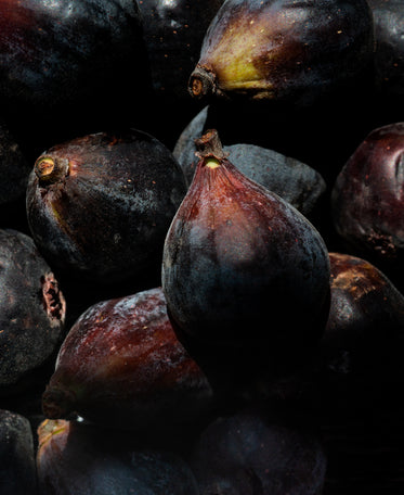 a pile of purple figs
