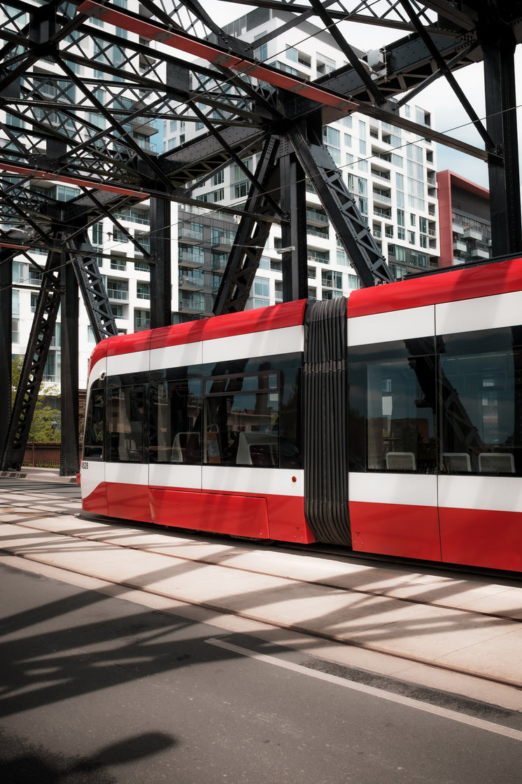 a-red-and-white-vehicle-under-a-metal-structure.jpg?width=746&format=pjpg&exif=0&iptc=0