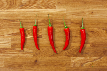 a row of hot red peppers