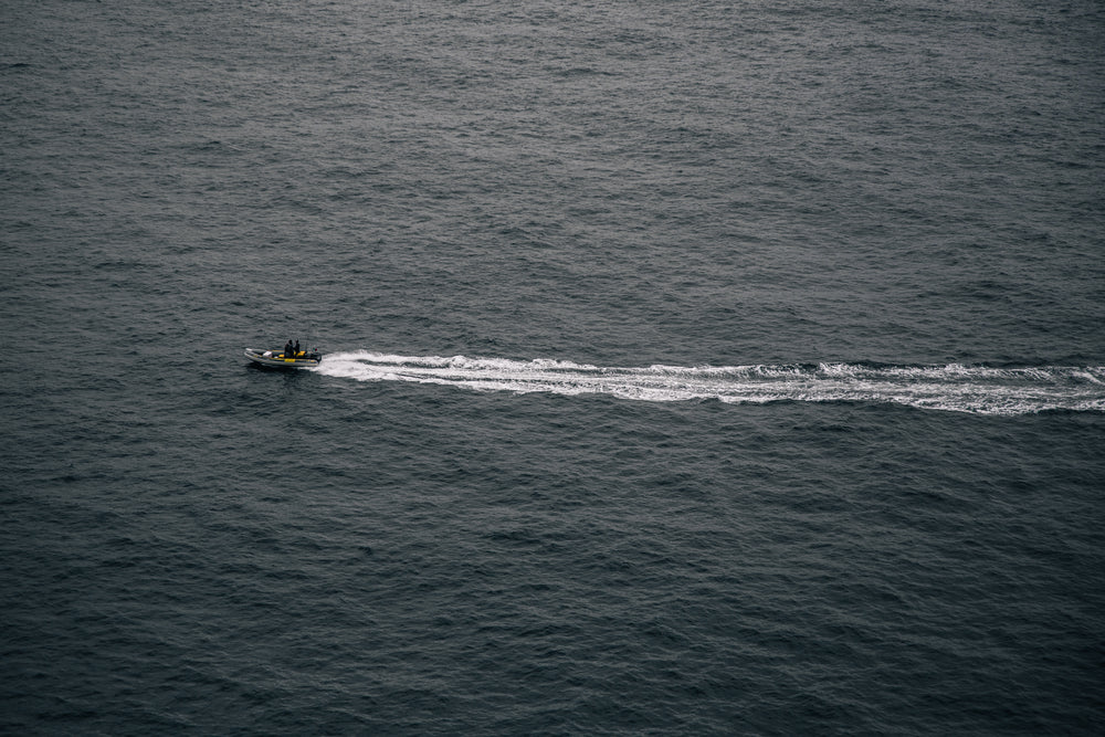 a safety dinghy patrols icy waters