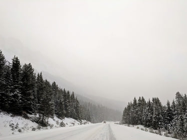 a single truck on a snowy road