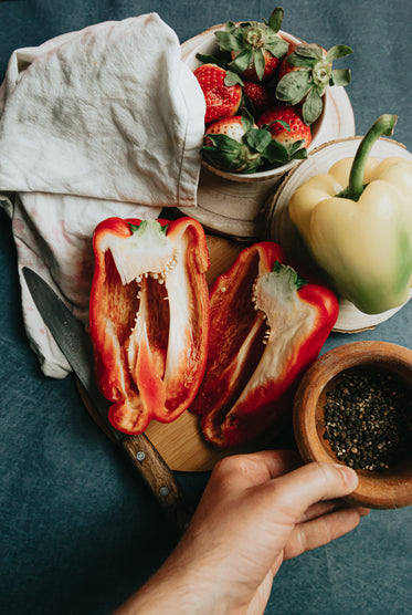 a sliced bell pepper surrounded by other cooking items