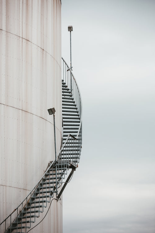 a staircase climbs a building