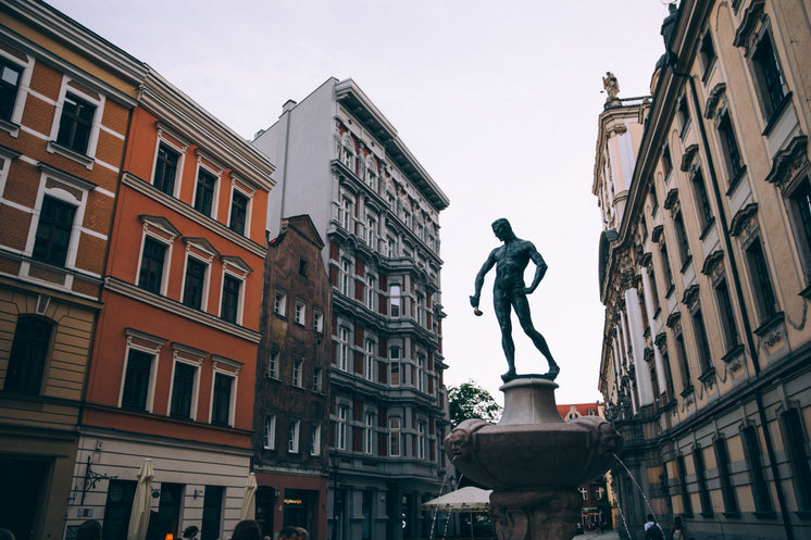 a-statue-of-a-man-holding-a-ladle-in-a-town-square.jpg?width=746&format=pjpg&exif=0&iptc=0