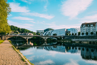 a stone bridge over a river