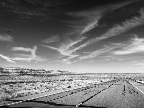 a sun-cracked highway through the desert