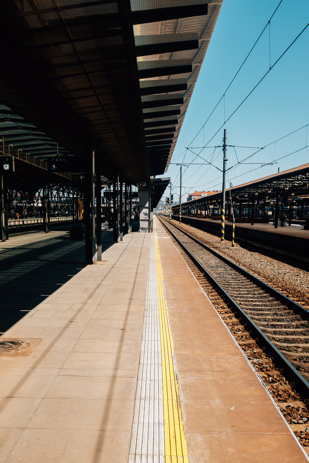 a symmetrical view of outdoor train station