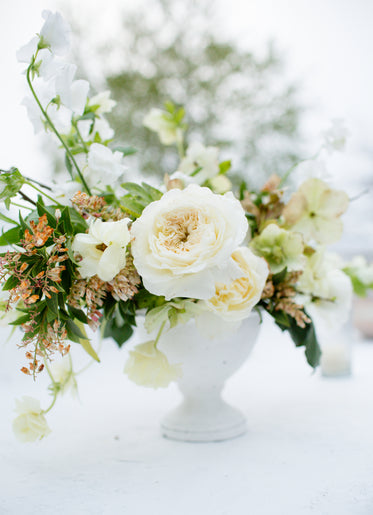 a table bouquet with green accents