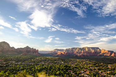 a town in the plains encircled by rocky mountains