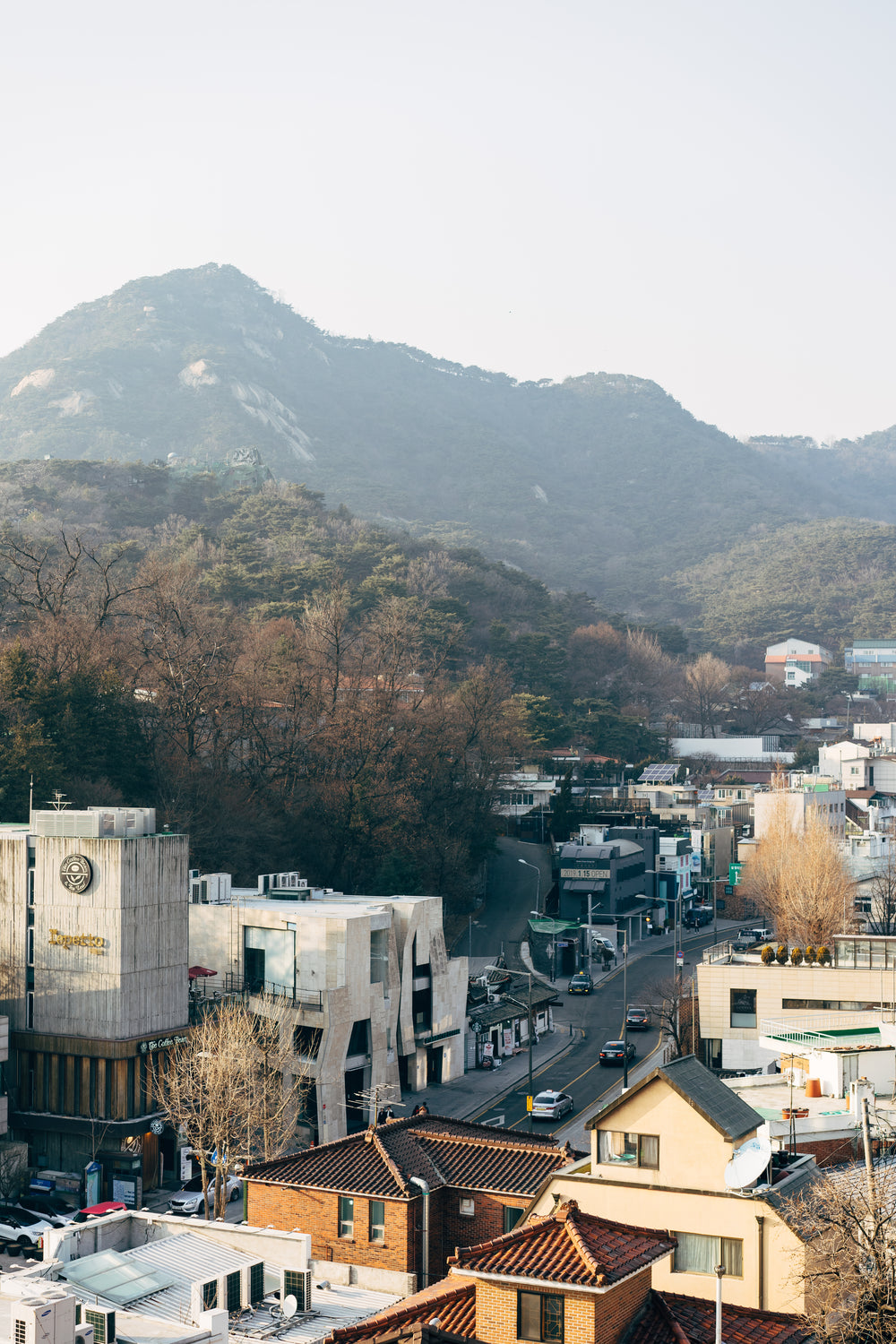 a town nestled beneath a mountain