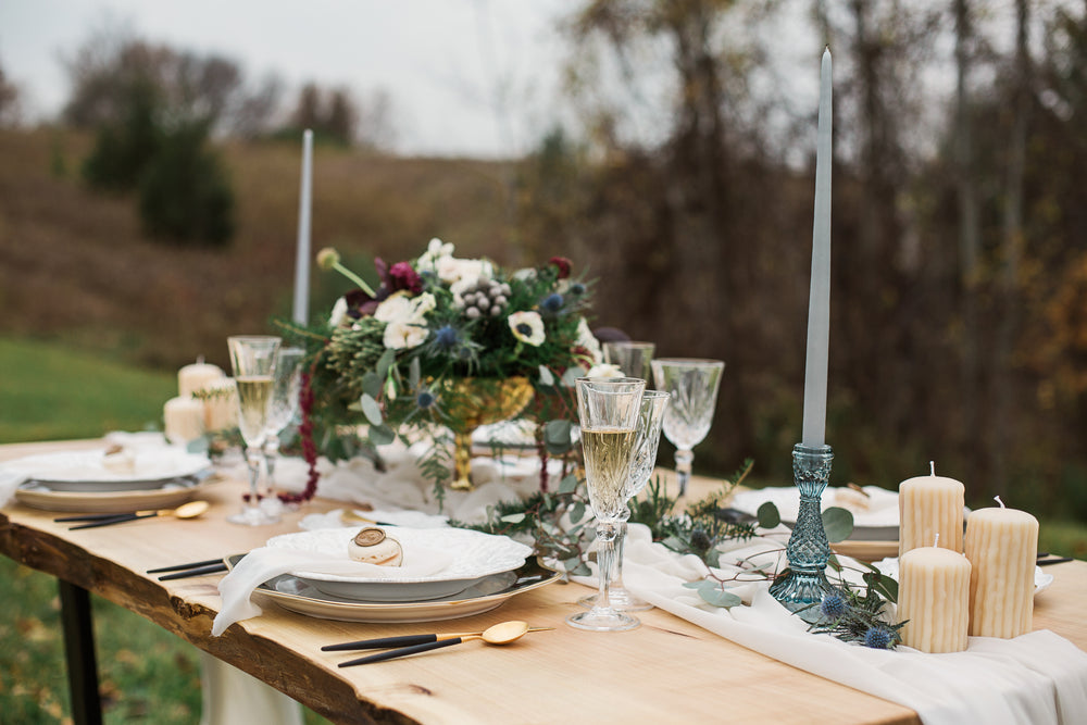 a wedding table decorated with flowers