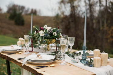 a wedding table decorated with flowers