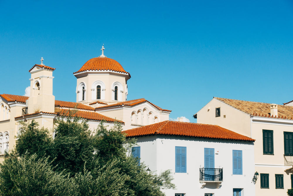 a white building with blue shutters