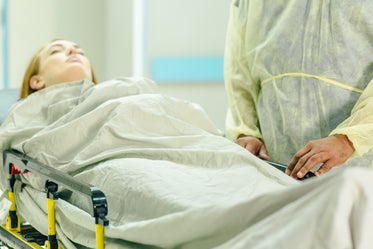 a woman is visited by a doctor in hospital