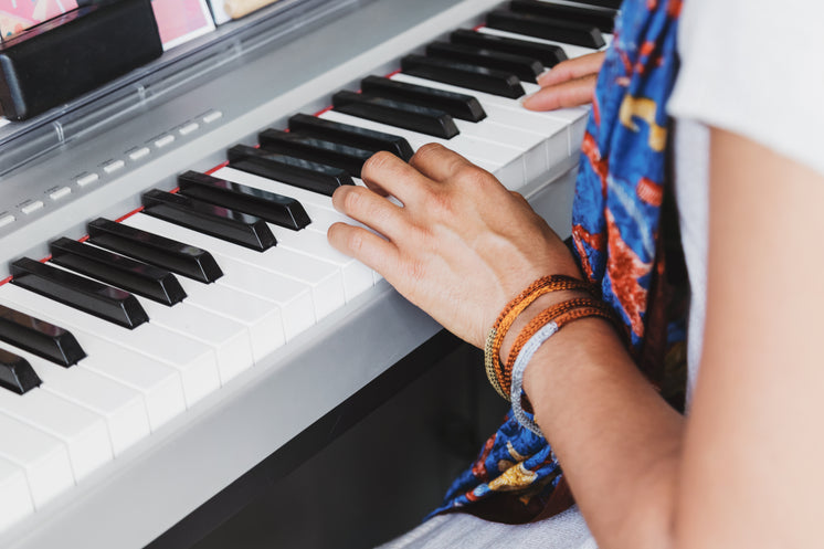 A Woman Plays The Piano